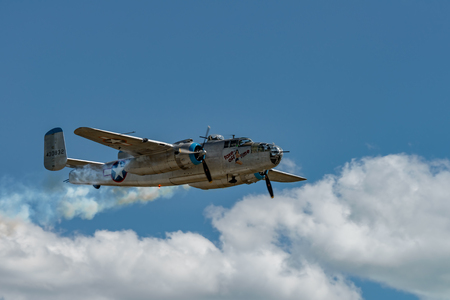 READING, PA - JUNE 3, 2017: North American
B-25J "Mitchell 'Take off Time In flight during World War II reenactment at Mid-Atlantic Air Museumのeditorial素材