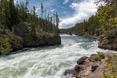 The Yellowstone river plunging down into the grand canyon of yellowstone.の写真素材