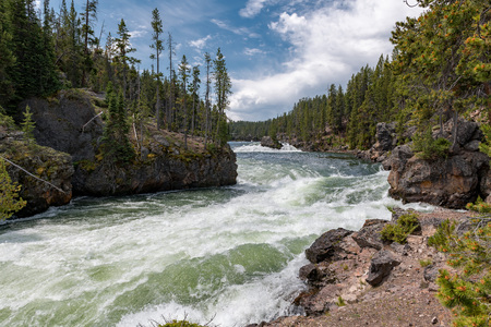 The Yellowstone river plunging down into the grand canyon of yellowstone.の写真素材