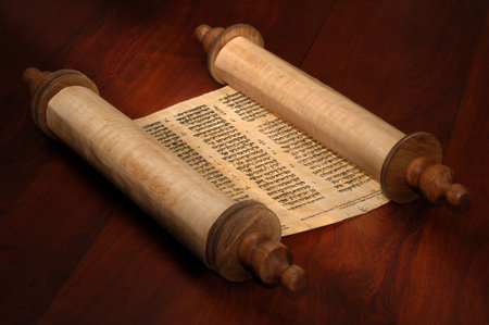Ancient scrolls of papyrus paper with Hebrew text
