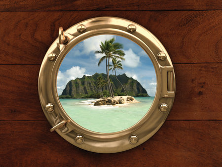 Porthole inside a ship with a view of a deserted islandの写真素材