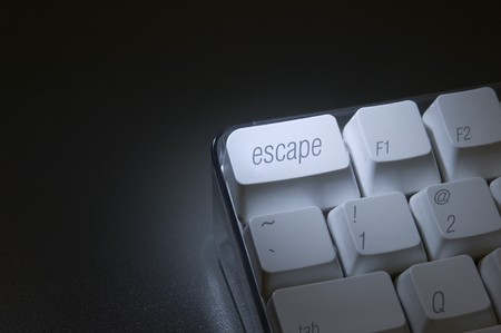 Closeup of the "escape" key on a computer keyboardの写真素材