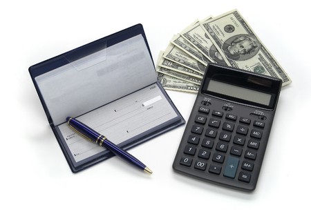 financial analysis; checks, graphs, money, calculatorの写真素材