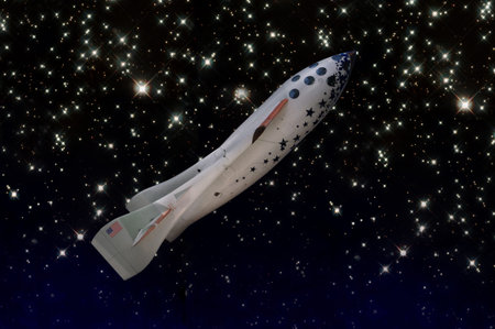 Space Ship One against a starlit space backgroundの写真素材