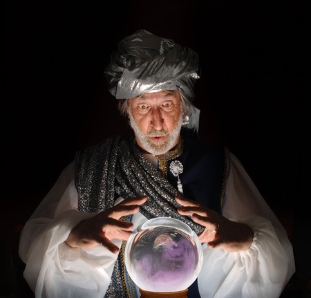Swami gazing into a crystal ballの写真素材