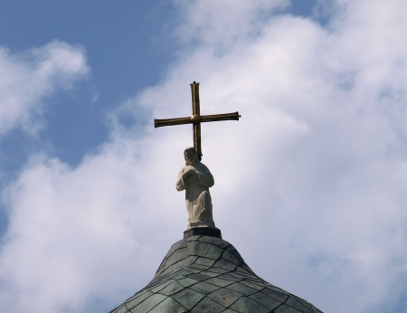 Figure of Jesus Christ on church s roofの写真素材