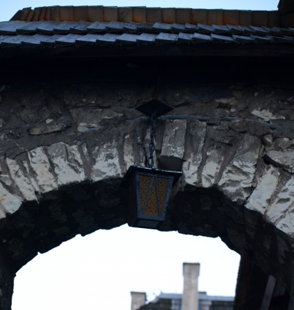 Street lamp on stoned buildingの写真素材