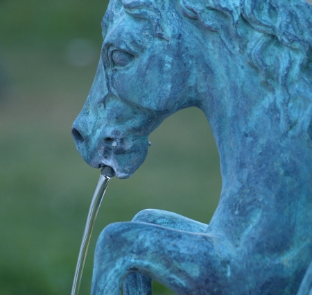 Zamosc, Poland - September 08  Decorative fountain with sculptures in old city street in Zamosc on September 09, 2013 in Zamosc, Polandのeditorial素材