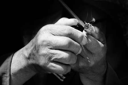 close up of hands with smokeの写真素材