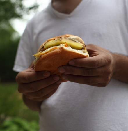 Holding burgerの写真素材