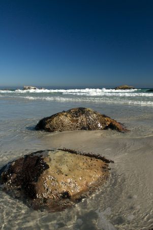 Rocks in Water at the Beachの写真素材
