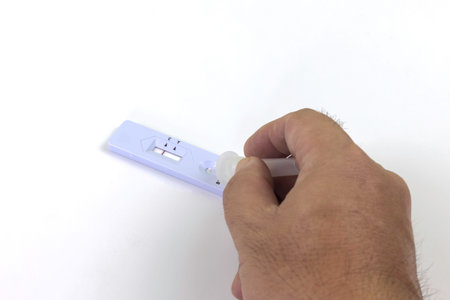 Rapid antigen test kit with the over-the-counter diagnostic test kit and at-home detection on white...