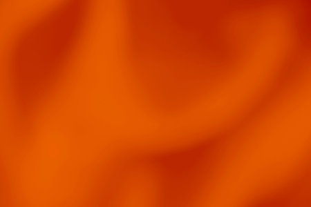 Empty orange textured wall blurred focus. Abstract background gradient color smooth template texture light elegant beautiful for web design.の写真素材