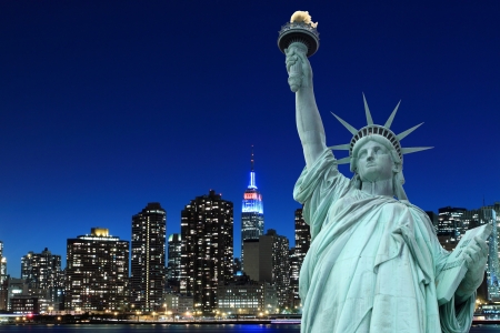 Manhattan Skyline and The Statue of Liberty at Night, New York City の写真素材