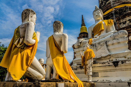 Buddha statues at Wat Yai Chai Mongkol in Ayutthaya.の写真素材
