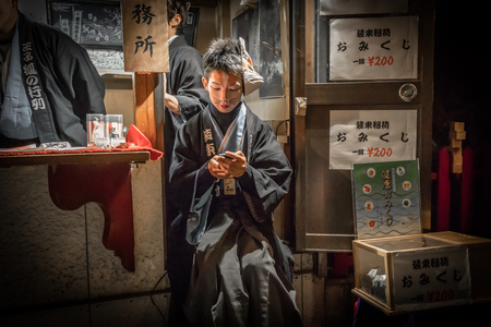 New Years eve in Oji celebrates the fox. The deity of the local inari shrine. A parade of of people dressed like foxes proceeds to the shrine for the first prayer of the new year at midnight.のeditorial素材