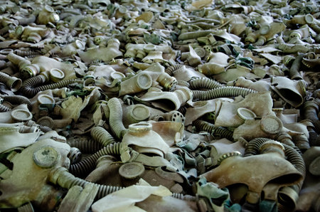 Ggas masks on the floor of Prypiat school, Chernobyl exclusion zone, Ukraineの写真素材