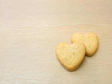 Heart cookies on wood background   Space for text 