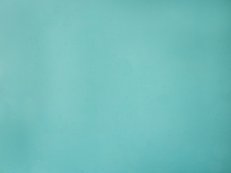 Teal blue green cement wall texture backgroundの写真素材