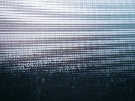 Frosted glass with water stain texture backgroundの写真素材