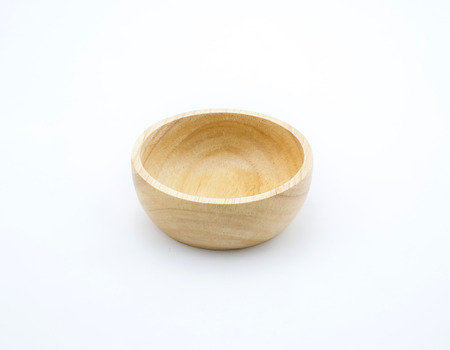 isolated wooden bowl on white backgroundの写真素材