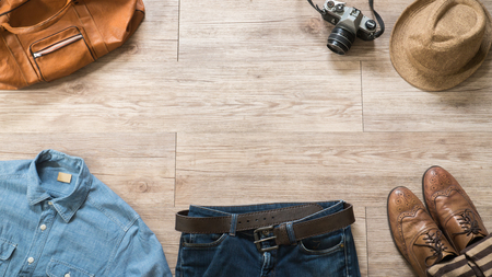 Top view of Vintage clothing and accessories on the wooden background ( Composition and space for text )の写真素材