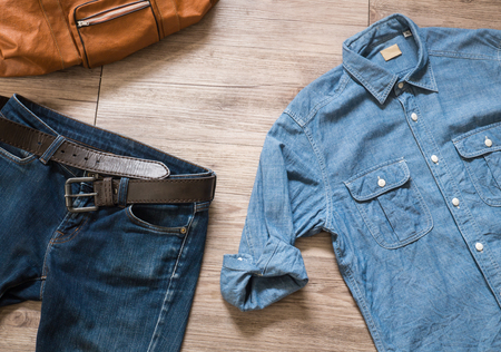 Top view of Vintage clothing and accessories on the wooden backgroundの写真素材