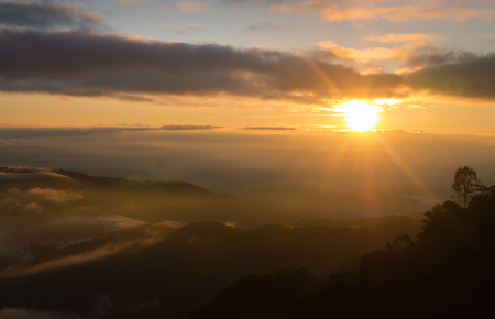 Landscape of  sunrise and moving mist in the mountain and hill . View sunrise  point of mountain at Doi-Montngo, Chiang Mai Ã¢ï¿½ï¿½Thailandの写真素材