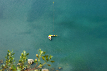 beautiful, little rowing boast on crystal clear water. Bird view.  Amalfi Coast, Italy.の写真素材