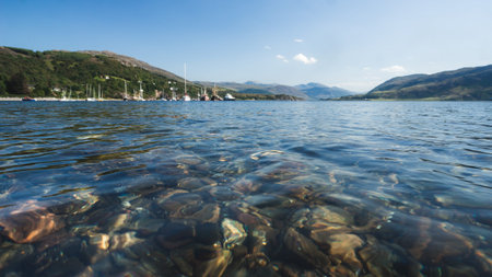 beautiful harbor sunny day in Ullapool, Scottish Highlands, Scotland, United Kingdom; Quaint Village...