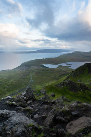 Rainbow by the Old Man of Storr at the Isle of Skye. Hiking in the Quairing Mountains on the Isle of...