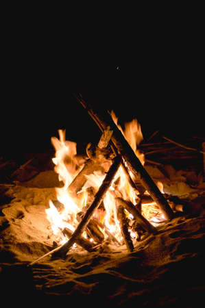Inviting campfire on the beach in the summerの写真素材
