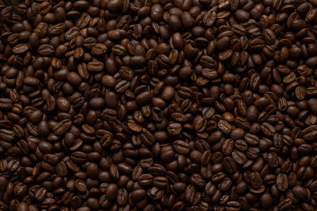 Fresh coffee bean background - texture of coffee beans