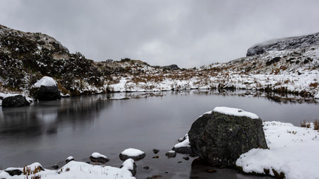 Lagoon located in the Los Nevados National Natural Park in Colombia, with a background of rocks and...