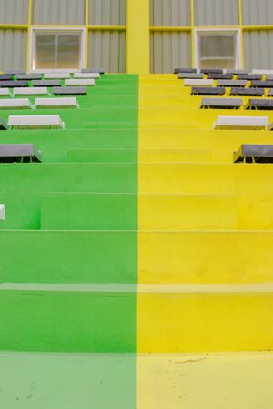 Green yellow stairs in the stadiumの写真素材