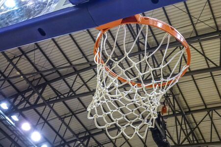 back view under hoops basketballの写真素材
