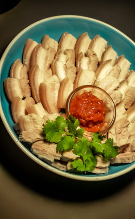 Boiled pork belly with Korean chili sauceの写真素材