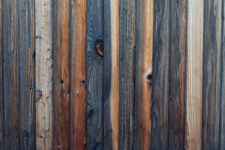 Rough textured wood plank fence.の写真素材