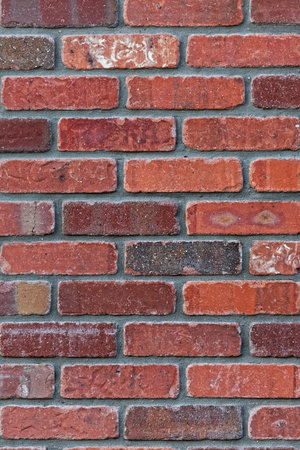 Architectural background close up detail of precision masonry brick wall.