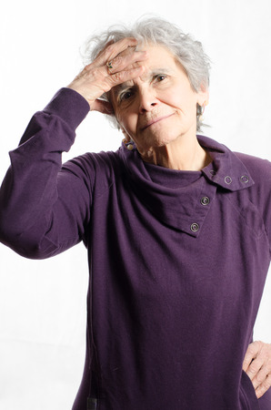 old woman with headacheの写真素材