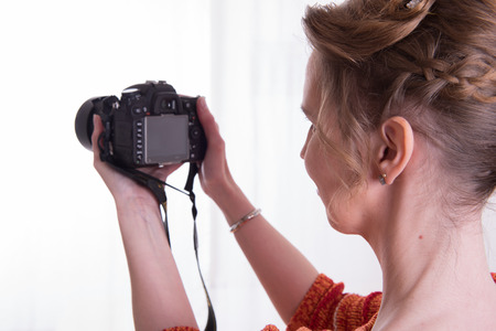 female Photographer at workの写真素材