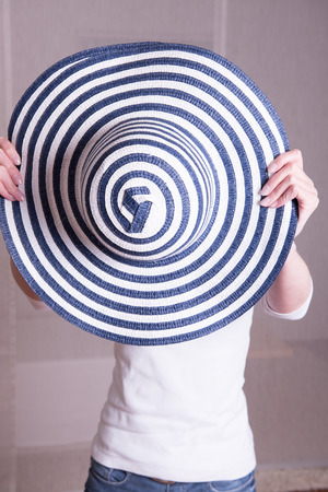 attractive woman with hatの写真素材