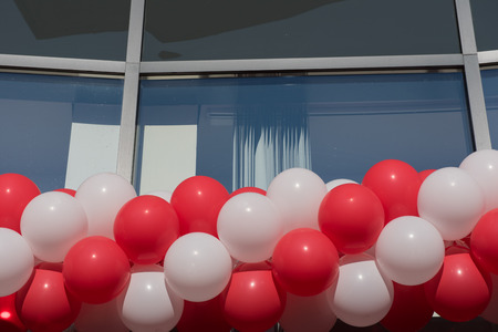 red and white balloons at an office building in Hildenの写真素材