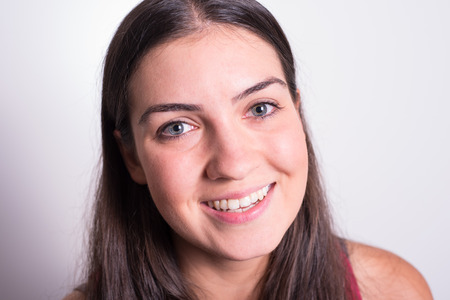 portrait sporty young girl smiling into cameraの写真素材