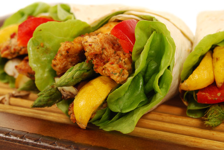 Fajita wrap sandwich with griddled chicken and saladの写真素材
