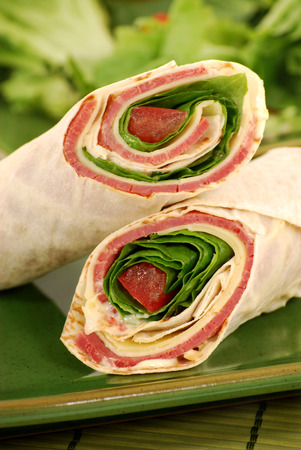 Wrap sandwich of  roast beef and cheese with saladの写真素材