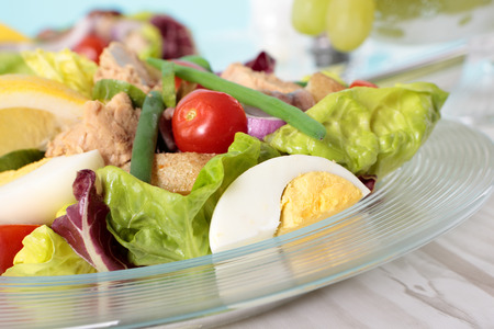 Nicoise salad in glass bowl closeupの写真素材