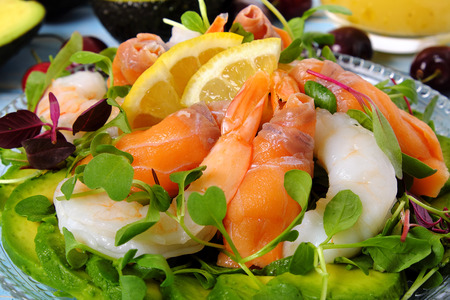 Salmon and prawn summer salad close upの写真素材
