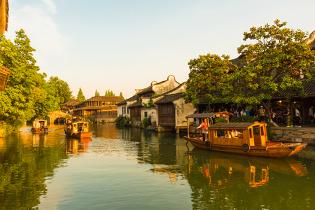 Boats traveling in the canal of Wuzhen, Zhejiang, Chinaのeditorial素材