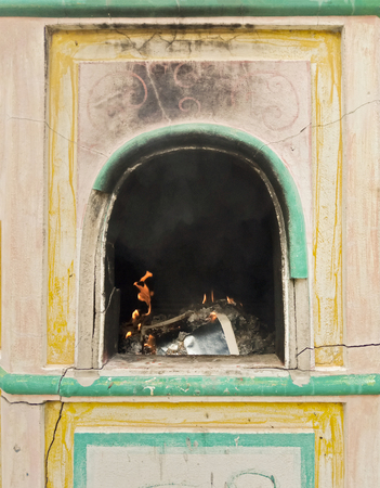 Old Chinese oven for burn paper in shrineの写真素材